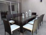 Juego de comedor Belmont de 11 piezas en ratán sintético para exteriores